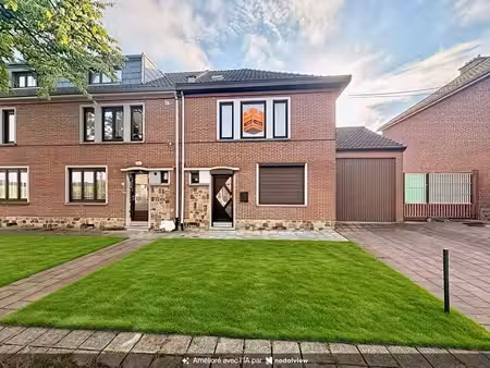 maison rénovée avec jardin et garage