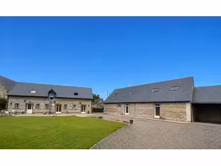 ensemble immobilier de deux batisses   sur bénouville
