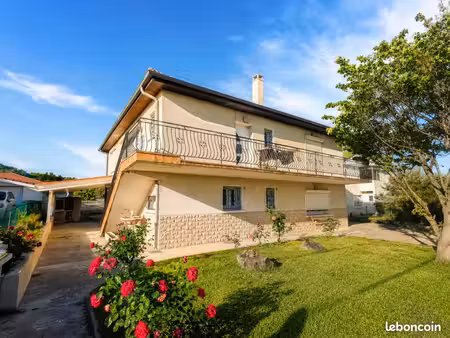 rez-de-jardin 108 m² + grand terrain + studio + garage