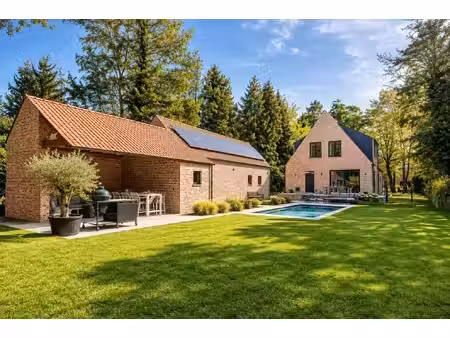 stijlvolle villa met zwembad en royale garage/loods op toplocatie in brasschaat