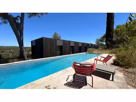 villa à vendre à castelnau-le-lez - maison d’architecte de plain-pied avec piscine et vue.
