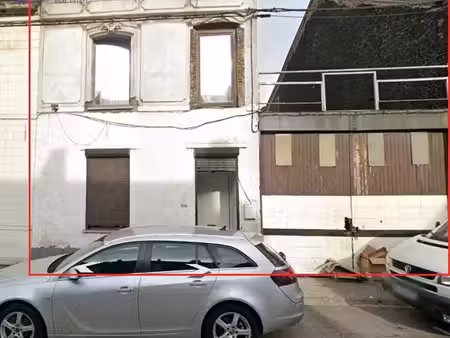 maison 2 chs avec vaste entrepôt  caves et jardin