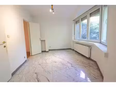 appartement 1 chambre de ± 44 m² avec cour privative