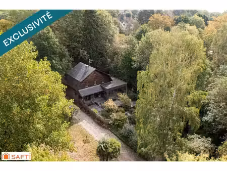 propriété nichée au sein d'un parc arboré de 5565 m2