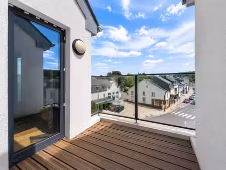 superbe appartement à halanzy : parking couvert  cave & ter