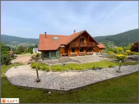 chalet d'exception avec grand terrain paysagé de 2000 m2   proximité des pistes et de la n