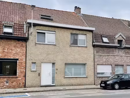 ruime gezinswoning met grote zuidgerichte tuin  garage en polyvalente ruimte