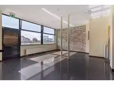 ruime woning met handelsgelijkvloers op centrale locatie ...