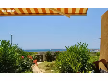 palavas-les-flots - f2 meublé 50 m2 - face à la mer - jardin privatif - parking - disponib