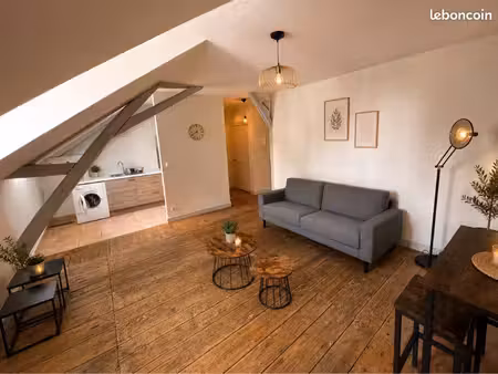 appartement de charme avec place de parking couverte en hyper centre