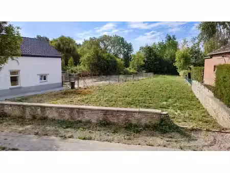 terrain plat de +- 7 ares à bâtir (permis obtenu)