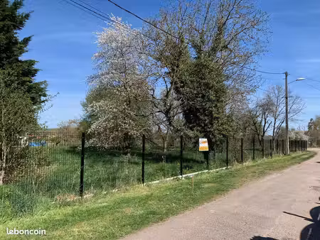 terrain 1100 m² croismare
