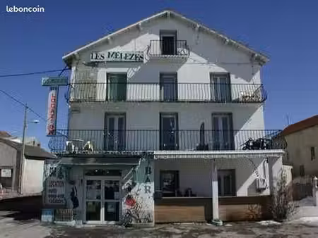 immeuble 12 appartements + local commercial