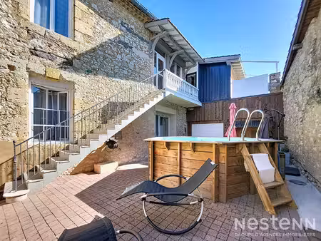 à vendre maison de village en pierre de 216 m² avec deux appartements  cour  et garages