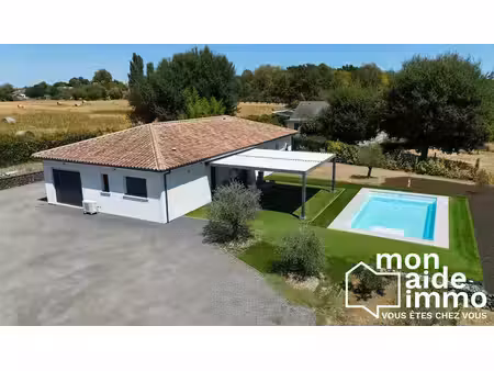 maison de 118 m² avec piscine et garage sur un terrain de 1 950