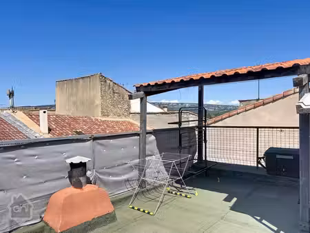 maison de village avec toit terrasse