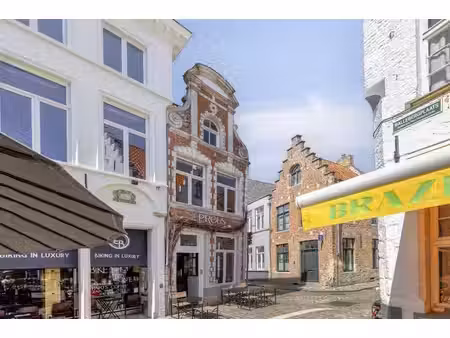 acquisition du restaurant « preus » près de la place du marc