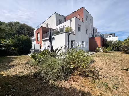 3%com beau rez de jardin - 3 chambres - garage double - parking- cave