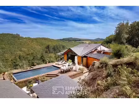 chalet d'exception où l'élégance contemporaine s'allie à l'architecture organique