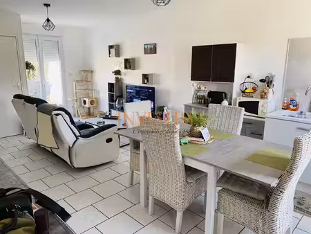immeuble collectif de 2 logements avec garage et jardin