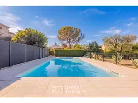 rez-de-jardin d'exception à mouans-sartoux : la quiétude d'une maison  le confort de la vi