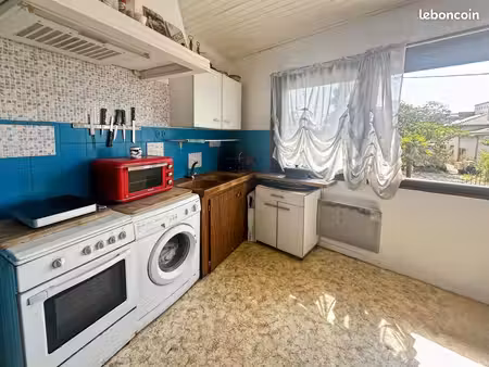 immeuble 3 pièces 104 m²
