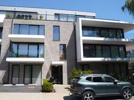 appartement à louer avec garage et terrasse   hal (vbe62405)