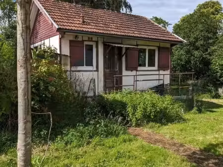 petit chalet aménagé sur 752 m² – village du vexin (site classé)