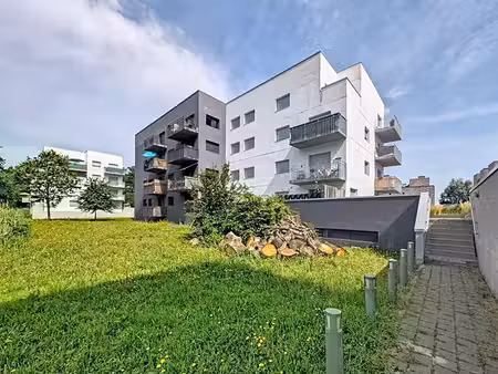 t4 duplex avec terrasse  vue sur espace vert et parking