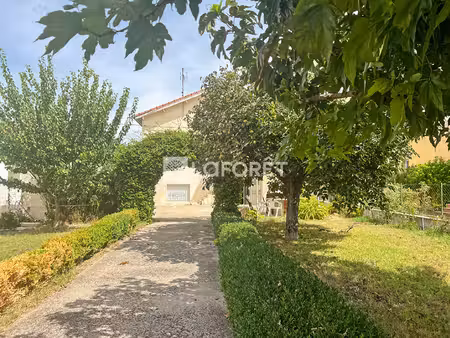 maison de 120m² divisée en 2 logements