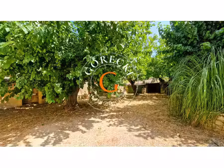 a vendre à 6 km d'uzès  authentique maison de village avec dépendances et jardin