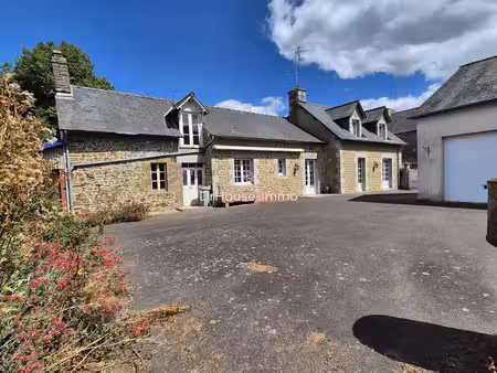 a 10 mn de gorron  belle maison en pierres  3 chambres dont 1 au rdc  garage  terrain de 1