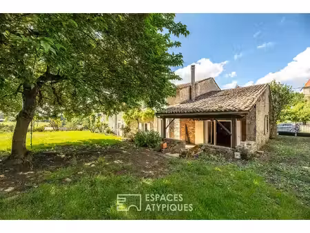 maison en pierre avec dépendance  jardin clos et potentiel familial