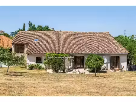 stone property with pool on the edge of a village