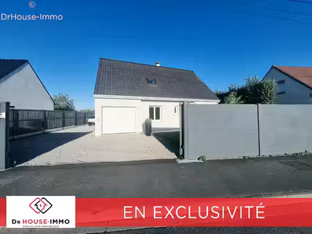 maison individuelle semi plain pied avec jardin.