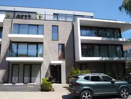 moderne appart 1ch. + grande terrasse + empl. parking