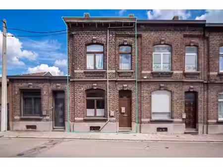immeuble mixte – 2 appartements loués + commerce
