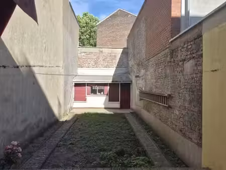 beau duplex +/- 86 m² avec grand jardin au coeur d' ixelles