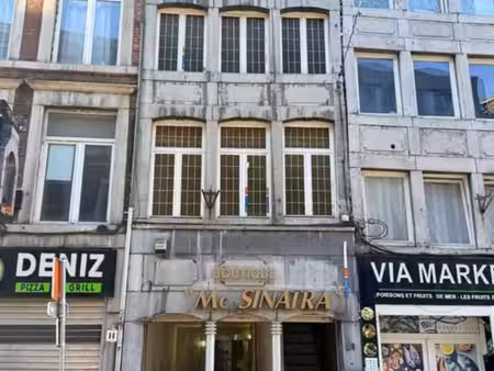 vaste maison de commerce  avec habitation  à rénover