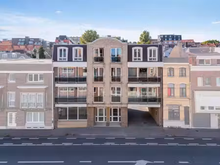 immeuble de rapport : 8 app.  5 garages  4 parkings