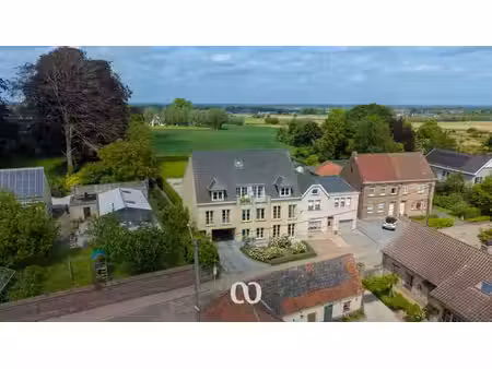 appartement au rez-de-chaussée avec 3 chambres  garage et j
