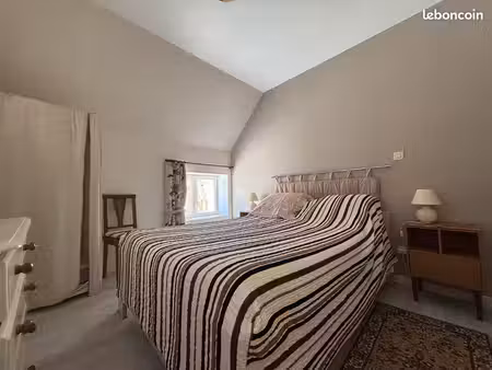 maison t2 avec véranda  garage et jardin
