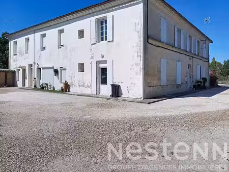 immeuble de 9 appartements une maison individuelle et 4 garages déjà loués !