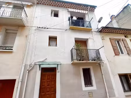 bel immeuble 2 appartements et grand garage.