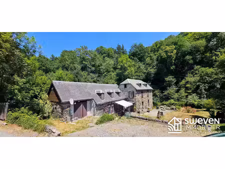 ancien moulin rénové t6 au bord d'une rivière