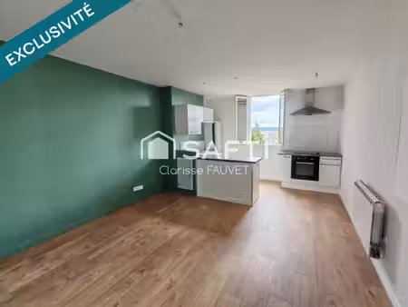 un nid douillet dans un petit immeuble vous attend