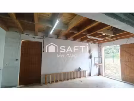 dépendance avec 660 m2 de terrain au coeur du village negociable
