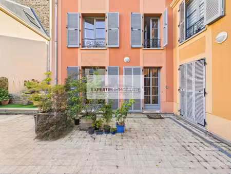 triplex 4p de 107m² avec terrasse  avec cave et double pkgs en sus