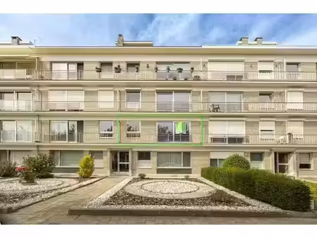 verzorgd 3-slaapkamer appartement met garagebox