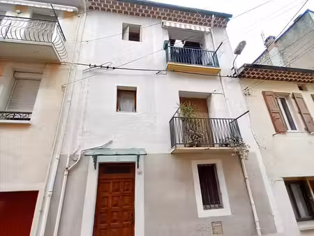 bel immeuble 2 appartements et grand garage.